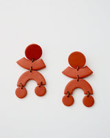 Handmade Polymer Clay Statement Earrings in Terracotta color Cute and modern clay dangles in geometric shapes. Available with hypoallergenic titanium posts or clip-on option. Stylish and lightweight measuring at only 2.25" long.