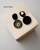 Handmade Brass & Polymer Clay Statement Earrings. Modern clay dangles with brass sunburst charms. Available with hypoallergenic titanium posts or clip-on option. These are stylish, lightweight and will be a standout for a chic daytime look or a night out.