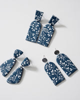 Handmade Blue & White Floral Print Polymer Clay Statement Earrings. Modern and cute denim blue clay dangles with detailed white floral print. Available with hypoallergenic titanium posts or clip-on option.