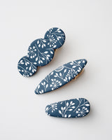 Handmade Oval & Circle Polymer Clay Hair Barrettes.  Botanical print clay hair clips in oval, circle and dagger shapes. Polymer clay hair barrettes with gold color alligator clip backing.