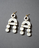 Handmade Ivory Polymer Clay Statement Earrings.  These modern and lightweight clay dangles bring movement and style to your day or evening.  Geometric. earrings with a touch of boho vibe. Hypoallergenic gold plated earring posts.