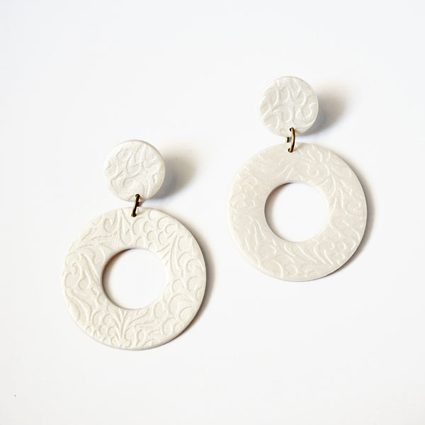 Handmade pearl color polymer clay earrings & clay studs with flower print.